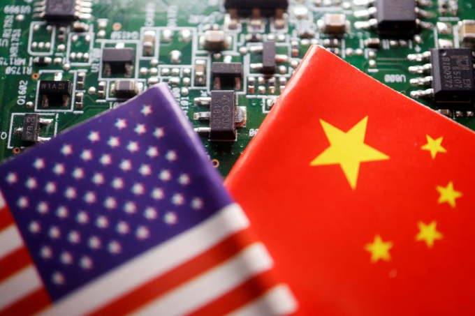 Flags of China and America photographed on the same semiconductor circuit board. Photo: Reuters